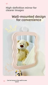Detail showing pink wavy frame wall-mounted mirror with high-definition reflection
