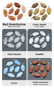 Detailed view of six coffin-shaped gemstone pendants in diverse natural crystal materials