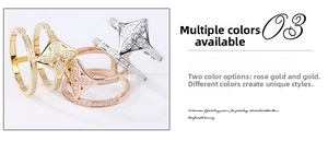 Detailed close-up of hollow flower rings in gold and silver with micro-pave crystals