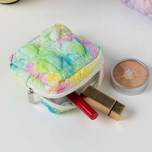 Macaron rainbow quilted makeup bag in soft fabric with zipper and padded design