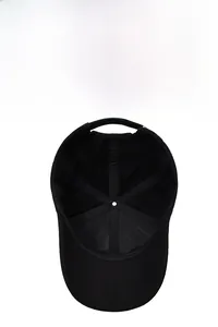 Detail view of the black baseball cap interior showing six-panel stitching and vent holes