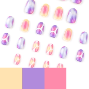 Short round gradient press-on nails with colorful bubble patterns and glossy finish