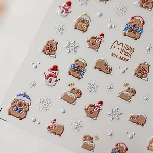 3D embossed nail stickers featuring winter capybara with scarves and snowmen