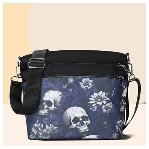Detail view of gothic skull and floral pattern on waterproof crossbody shoulder bag