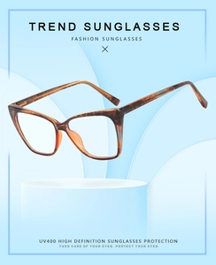 Detail view of TR90 tortoise cat-eye frame showing UV400 protection and blue light blocking