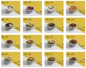 Detailed grid of 16 miniature blue and white porcelain bowl food model keychains