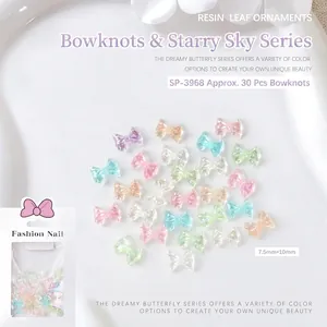 Macro shot of Aurora resin bow nail ornaments in SP-3968 packaging with 30 pieces