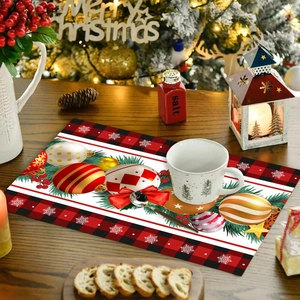 Christmas placemat with red-black plaid and festive ornaments in a cozy dining setting