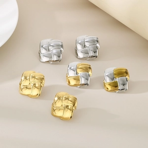 Detailed view of square braided texture earrings in gold, silver and two-tone metal finish