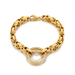 Bracelet à maillons en acier inoxydable plaqué or 18k avec pendentif cœur évidé et cristaux