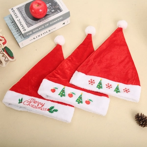 Three plush velvet Christmas hats with white fur trim and unique holiday embroidery