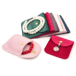 Multi-color velvet jewelry pouches with snap buttons for rings and necklaces