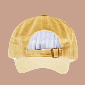 Detail view of the metal adjustable buckle and washed cotton texture on the baseball cap