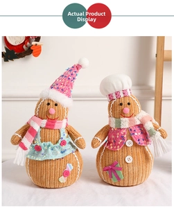 Detail of plush gingerbread figures with festive knit textures and sequin holiday decorations