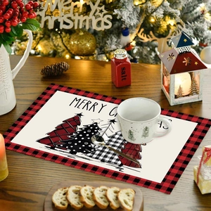 Christmas tree placemats with red plaid border and festive holiday table decoration set