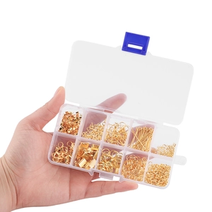 Gold jewelry DIY accessory kit with ear hooks and lobster clasps in a clear storage box