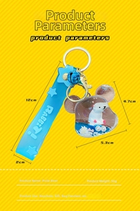 Blue polar bear keychain with liquid glitter oil, star wrist strap and metal bell charm