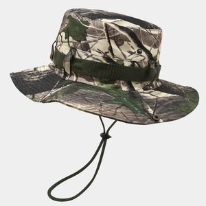 Detail of woodland camouflage boonie hat with metal eyelets and adjustable chin strap