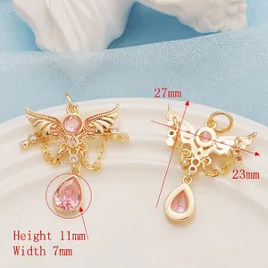 14K gold filled angel wing pendant with pink zircon and dimensions of 27mm by 23mm
