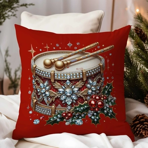 Close-up of red Christmas pillow with jewelry style drum pattern and festive decor