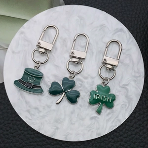 Three-piece Irish St. Patrick's Day keychain set with green clover and lucky hat charms