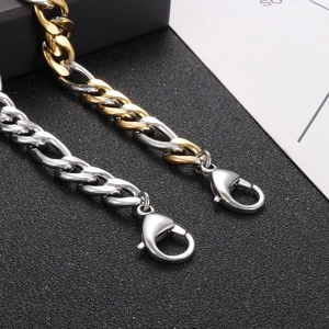 Bracelet à mailles gourmette en acier poli avec grand fermoir mousqueton argenté et doré