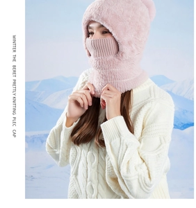 Detail of pink fleece winter hood with integrated neck warmer and face mask for outdoor use