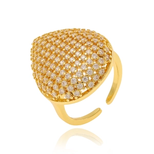 Macro shot of gold heart-shaped ring with pavé-set crystals on a white background