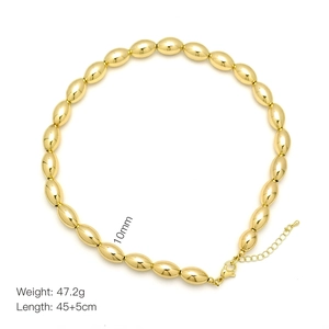 Detail of 10mm golden oval bead necklace with lobster clasp and adjustable extension chain
