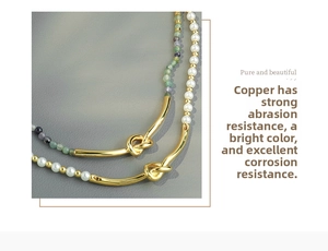 Detail of bohemian necklace with natural stones, purple glass beads and copper accents