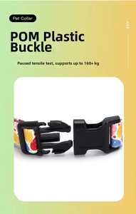 Close-up of durable black POM plastic buckle on a colorful floral pattern pet collar