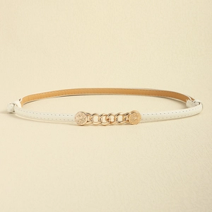 Detail of cream leather thin waist belt with gold chain link and engraved metal buckles