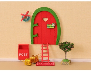 Detailed Christmas dollhouse miniature set featuring a red wooden door and festive accessories