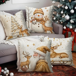 Set of 4 Christmas linen pillow covers with Santa and Snowman prints on a grey sofa