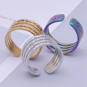 Three multi-layer adjustable 304 stainless steel rings in gold, silver, and rainbow colors