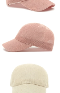 Detailed knit mesh texture and structure of breathable pink and beige baseball caps