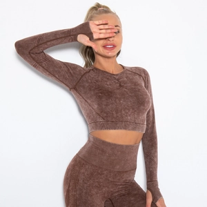 Detail of coffee brown acid wash gym top with thumb holes and ribbed knit cuffs
