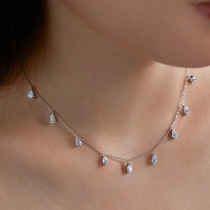 Elegant S925 sterling silver necklace with pear-shaped cubic zirconia charms