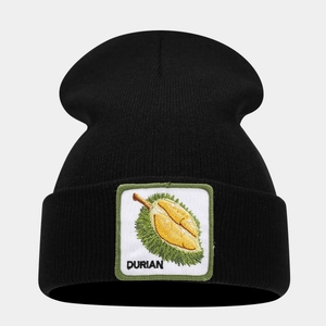 Close-up of black knit beanie featuring a square durian embroidery patch and DURIAN text