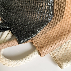 Handwoven large capacity tote bags in black, beige, and white colors with premium texture