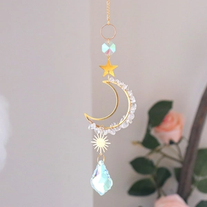 Detailed suncatcher view with golden crescent moon and crystal prism teardrop pendant