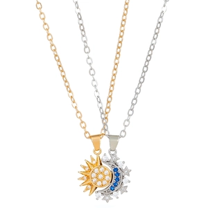 Detail showing magnetic sun and moon necklaces with gold and silver finishes