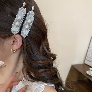 French style pearl petal hair clips set shown on model for an elegant hair accessory look