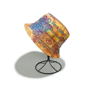 Yellow retro fisherman hat with peace symbol and vintage bus print in bohemian style