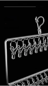 Macro view of thickened stainless steel frame and spring clips on a drying rack