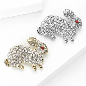 Sparkling crystal rabbit brooches in gold and silver finish with red rhinestone eyes