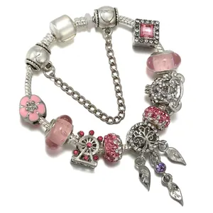 Silver plated beaded charm bracelet with pink crystals and Ferris wheel pendant