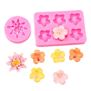 Pink silicone lotus and daisy flower molds for DIY cake decorating and soap making