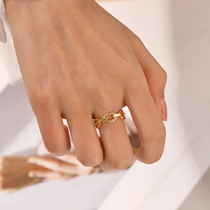 Minimalist gold chain link ring for women with adjustable open design on model's finger