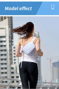 Action shot of a woman wearing the leopard print sports waist bag in an urban setting